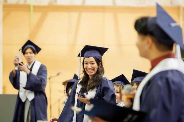 UWC ISAK Japan Class of 2023 student Marian from Thailand delivers a speech during the Graduation Ceremony