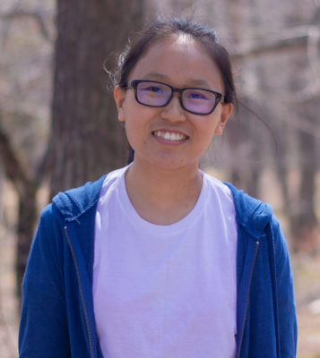 Lhamo (Class of 2020 / Nepal) portrait by sakura trees "Covid-19 Has Strengthened My Character"