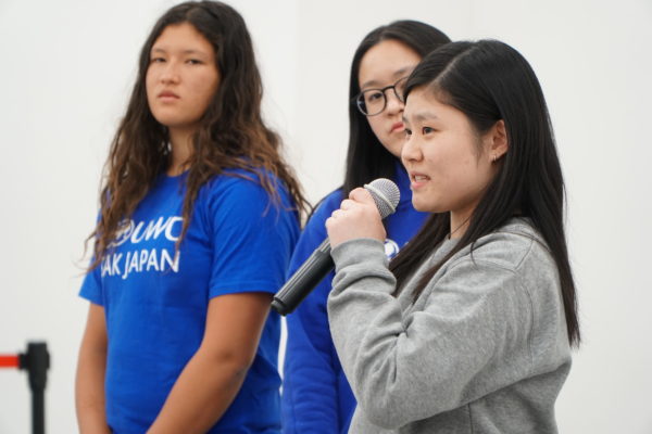 UWC ISAK Japan student lin speaking to Kamaishi High School students