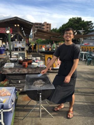 Ata, UWC ISAK Japan Class of 2017 student from Afghanistan making yakitori as a student job in APU