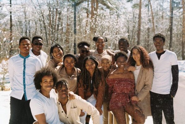 Cararise and other UWC ISAK Japan students of color posing outside in the snow for a group photo