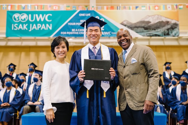 UWC ISAK Japan student Simon Xiao (New Zealand / Class of 2022) receiving his diploma at graduation ceremony