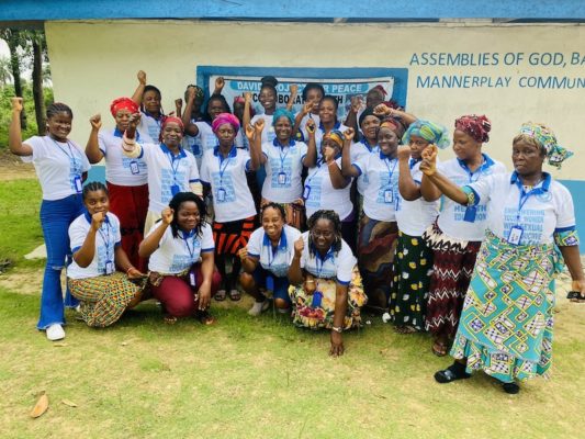 Junita (Liberia / Class of 2021) with a group of mothers mentoring young girls about sexual and reproductive health in the summer 2022