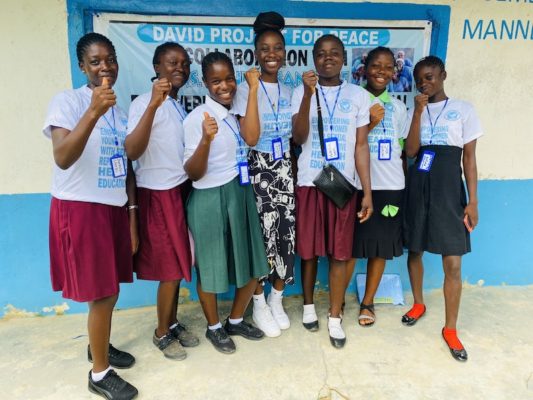 Junita (Liberia / Class of 2021) with girls at one of the sexual and reproductive health workshop she organized in Liberia in the summer 2022