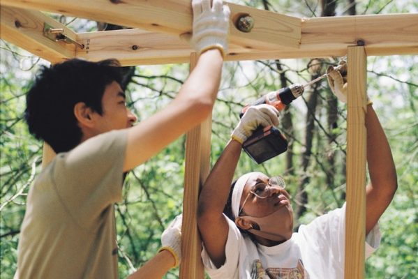 UWC ISAK Japan students building a tree house in the forest surrounding campus for their CAS project