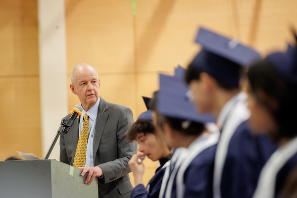 UWC ISAK head of school Malcolm McKenzie delivering a speech to the graduating Class of 2023