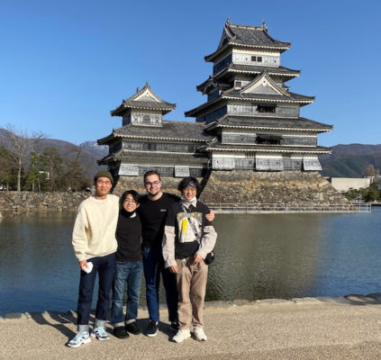 UWC ISAK Japan student Simon (New Zealand / Class of 2022) with friends in front of Matsumoto (Japan) castle