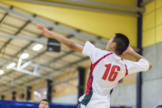 UWC ISAK Japan student Simon (New Zealand / Class of 2022) shooting at volleyball game