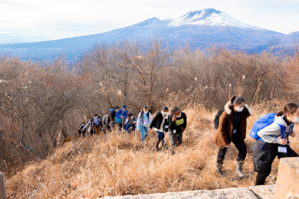 Winter School students enjoy hike up Hanareyama with Mt. Asama in the background
