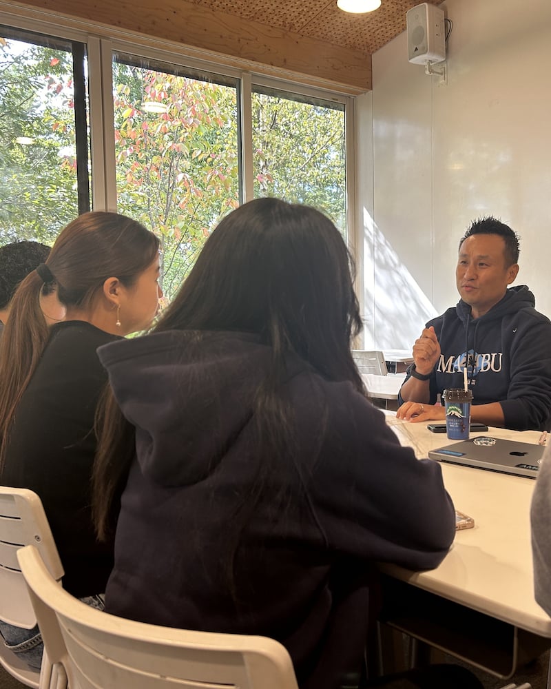 Students receiving project advice from entrepreneur and investor Matt Cheng during Project Week 2024.