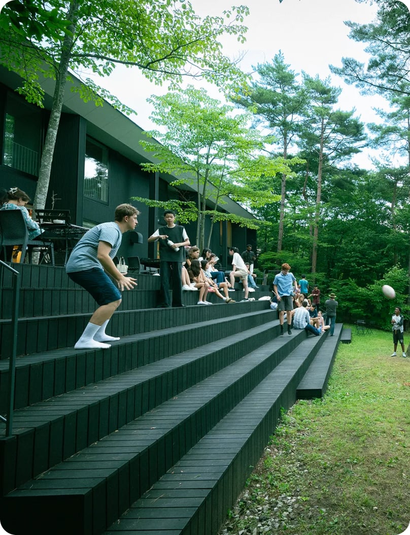 UWC ISAK Japan students sitting on the campus terrace