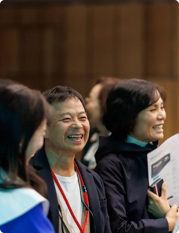 Supporters sharing a joyful moment at a UWC ISAK Japan event