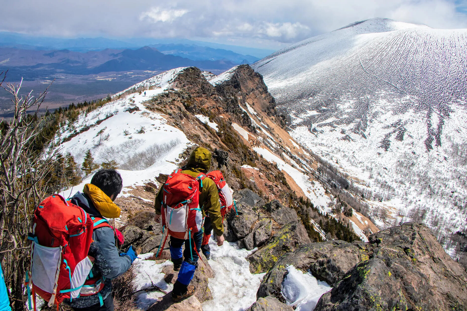 UWC ISAK Japan students hiking across a mountain ridge